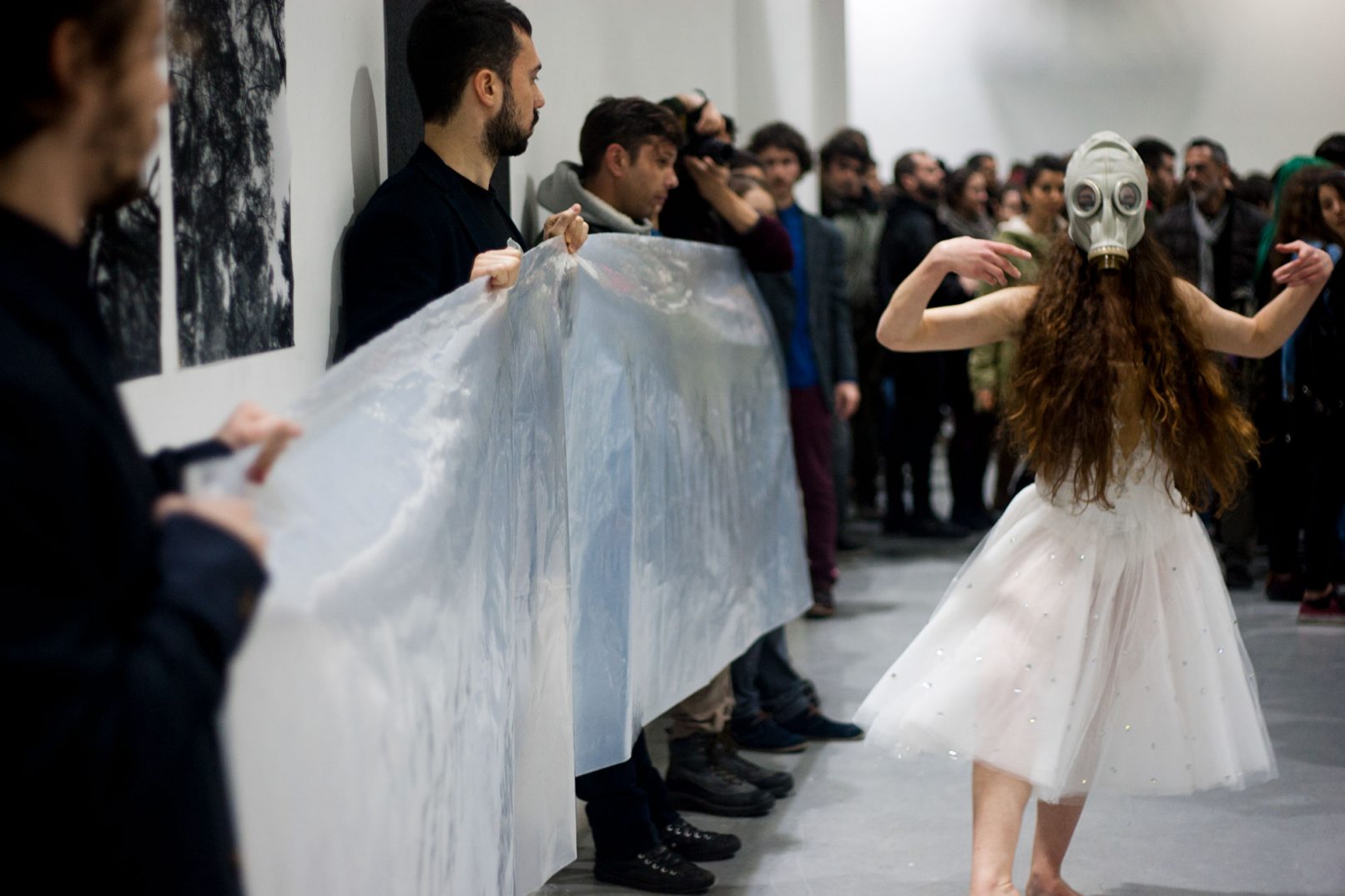 from the work breathe. Ballerina wearing a full face mask