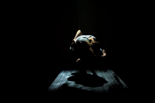 from the work matter. Depicts two dancers standing in the middle of the light installation that I did for the work Matter