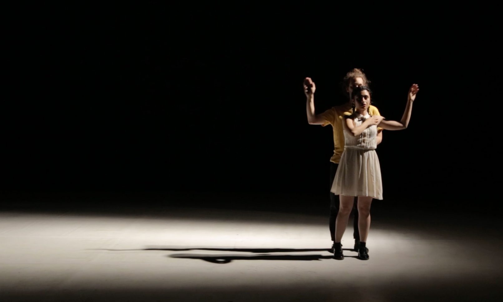 Still from the performance of the work angalia that means hug in greek